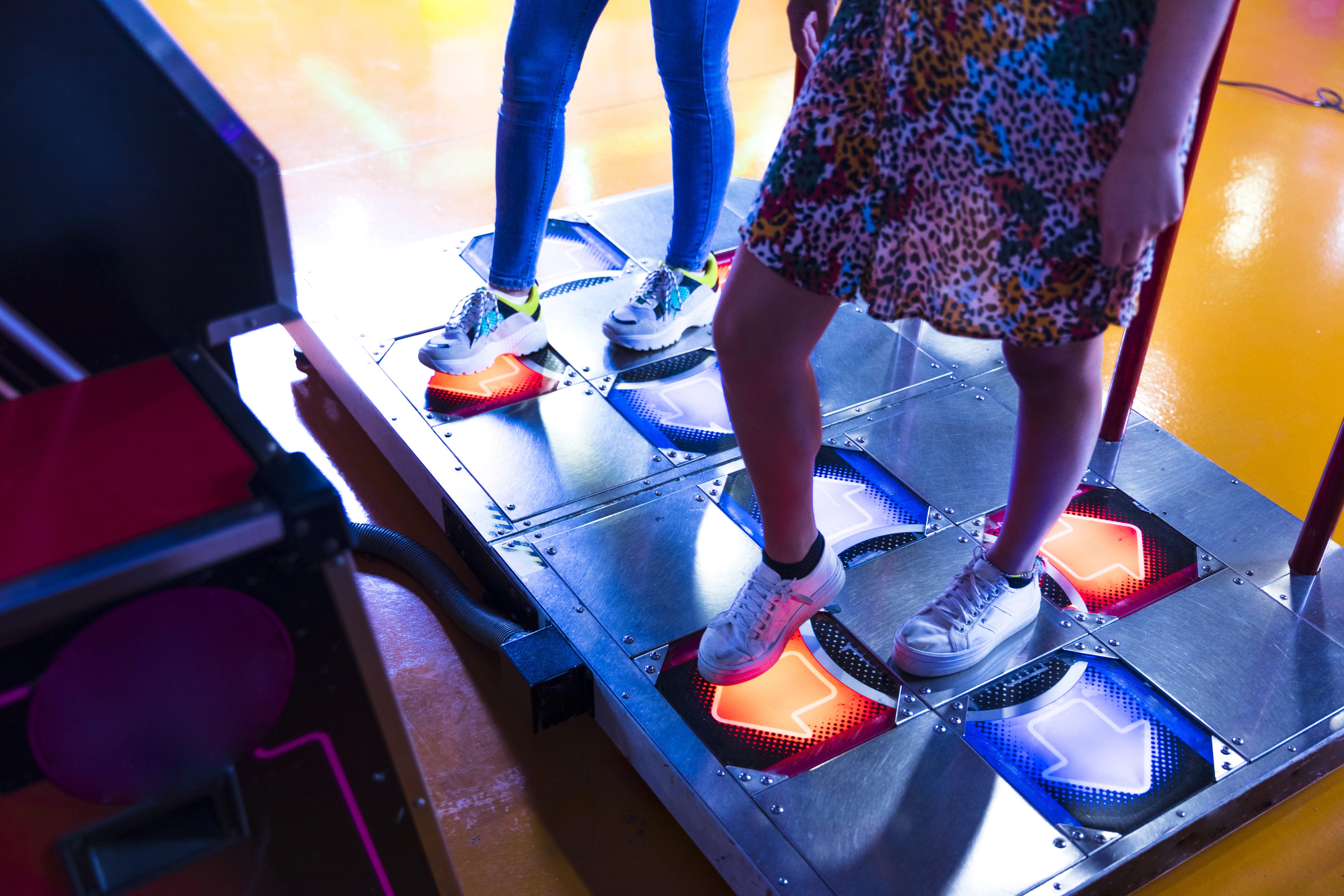 sideways-women-playing-dancing-arcade
