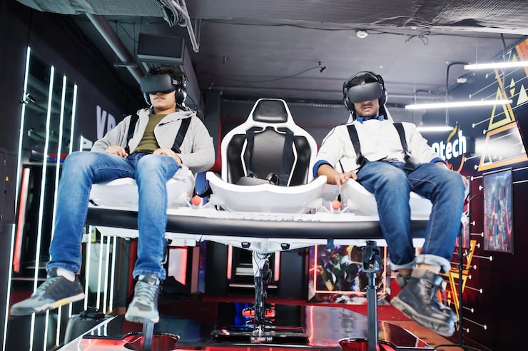 two-young-indian-people-having-fun-with-new-technology-vr-headset-virtual-reality-simulator_627829-1078